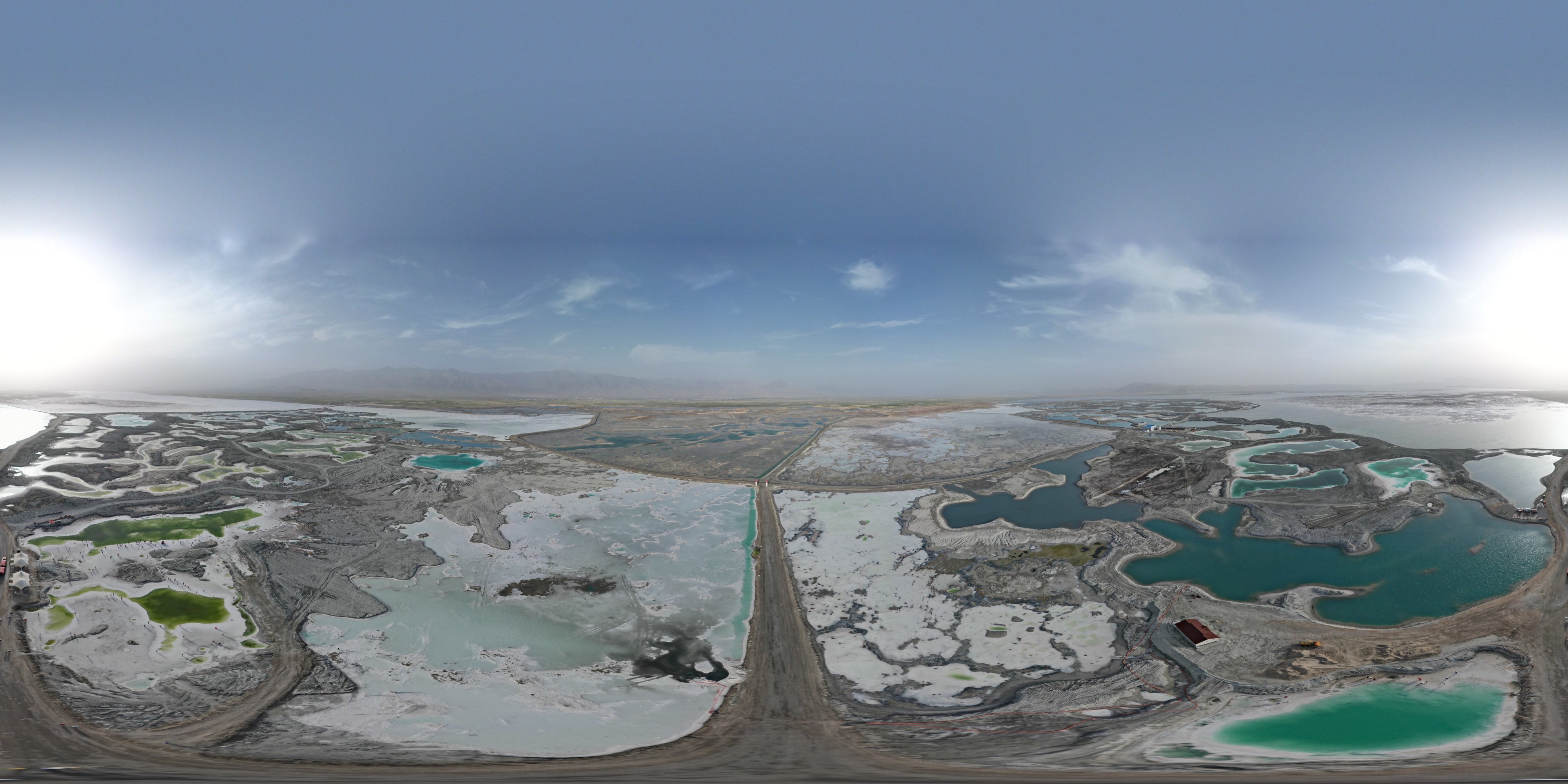Panoramic view, showing the greener lakes with higher salinity and the bluer ones with lower salinity